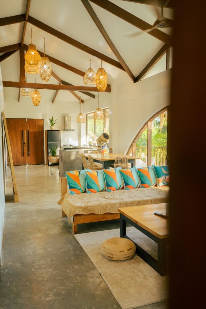 Studio villa exterior framed by palms at Villa Cali Siargao